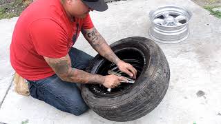 How to take a tire off the rim really easy  How to put a tire on a rim [upl. by Nattie]