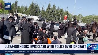 UltraOrthodox Jews riot outside of main IDF drafting center [upl. by Binny]