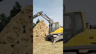 excavator loader handler forklift pellet biomass grass straw wheat hay bale cloth wheat [upl. by Oruam597]