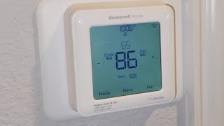 Honeywell Proseries Thermostat Battery Replacement [upl. by Aihsenek]