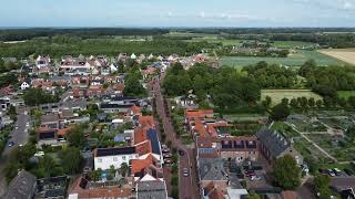 Drone flight over Oostkapelle Windmill Church and Camping in de Bongerd [upl. by Sucitivel]