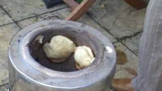 Naan bread in a Tandoori clay oven [upl. by Alin549]