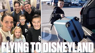 FLYING ON AN AIRPLANE WITH KIDS TO DISNEYLAND [upl. by Aron493]