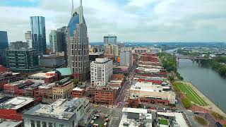 Drone of Nashvilles Lower Broadway the Cumberland River and The Four Seasons Luxury Residences [upl. by Donall]