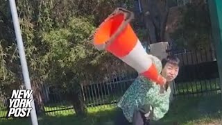 Woman hurls traffic cone at young driver in foul roadrage incident captured on video [upl. by Masson]