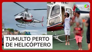 Rapper Oruam pousa helicóptero em meio a crianças no Rio e gera tumulto [upl. by Rehtaeh]