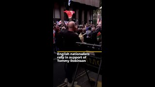 English nationalists rally in support of Tommy Robinson  AJ shorts [upl. by Seebeck974]