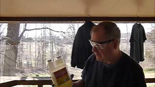 Applying permethrin to hiking clothes [upl. by Lacsap]