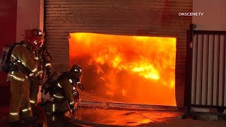 Firefighters Battle Massive Commercial Fire In Los Angeles [upl. by Novit]