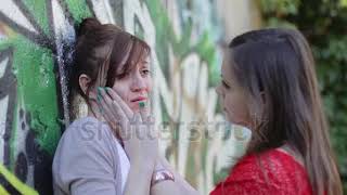 stock footage sad woman crying while hugging a friend color [upl. by Assecnirp]