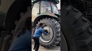 Agricultural tractor rear wheel disassembly process [upl. by Macgregor856]