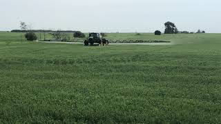 R4045 John Deere spraying fungicide on spring wheat [upl. by Joella769]