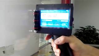 Meenjet M6 Handheld Inkjet Printer  Printing on Glass [upl. by Aicnatsnoc]