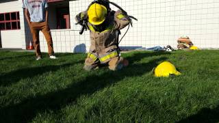 Donning Firefighting Turnout gear in 60 seconds [upl. by Olifoet870]