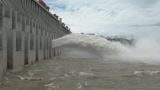 Three Gorges Dam discharges water [upl. by Rafaelle]