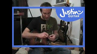 Change Electric Guitar Strings 1of2 Guitar Lesson [upl. by Ainaled262]