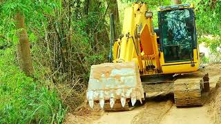 AX Excavator 130 PC and Abul push to clear the road [upl. by Joacima]