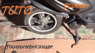 Démontage roue arrière scooter [upl. by Ilime]