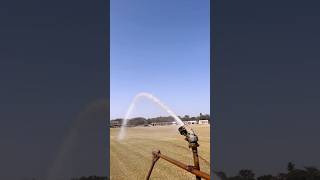 The grounds team brings the field to life sprinkling water to keep it green and ready for the game [upl. by Deth]