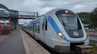 SL Pendeltåg X60 arriving at Tumba for Södertälje Centrum 150823 [upl. by Ayerf]