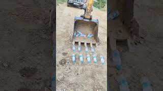 showcasing an excavator operators amazing skill in collecting a water bottle operatorlife [upl. by Aizitel876]