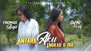 Thomas Arya feat Ovhi Firsty  ANTARA AKU ENGKAU DAN DIA Official Music Video [upl. by Gilpin]