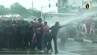 Members of NPP women’s wing come under police water cannon attack [upl. by Doble]