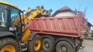 JCB 4cx backhoe loader loading a truck with dirt [upl. by Egan]