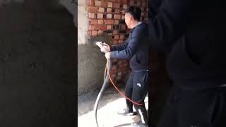 High pressure spray gun spraying process for cement mortar on interior walls [upl. by Pani]