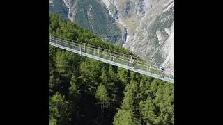 The longest suspension bridge in Alps drone alps switzerland [upl. by Enomahs413]