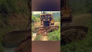 Young Man Uses Bulldozer to Clear Overgrown Road [upl. by Annahsal577]