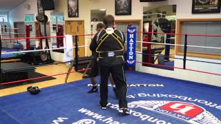 Ryan Burnett on the pads with trainer Ricky Hatton [upl. by Laucsap]