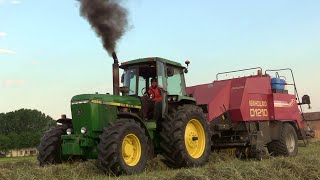 John Deere 4250  New Holland D1210 big baler  Power sound amp black smoke  POV amp cab view [upl. by Queen507]