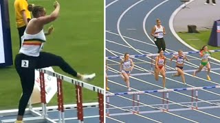 Belgian shot putter goes viral running hurdles to save team from disqualification [upl. by Dhiren36]