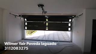 Portón eléctrico levadizo en aluminio a control remoto para garage [upl. by Glenden]