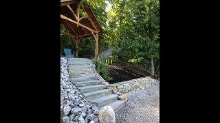 Dry stack stone retaining wall build [upl. by Ahsem75]