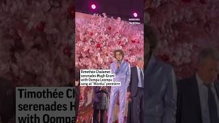 Timothée Chalamet serenades Hugh Grant with Oompa Loompa song at ‘Wonka’ premiere [upl. by Silenay518]