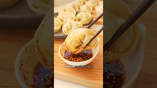 Kimchi Mandu  Korean dumplings filled with juicy kimchi ground pork vegetables and tofu [upl. by Yenduhc]