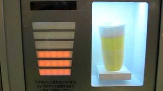 Draft beer from a Tokyo vending machine [upl. by Refynnej]