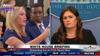 Between reporters Sarah Sanders at White House press briefing FNN [upl. by Wallace]