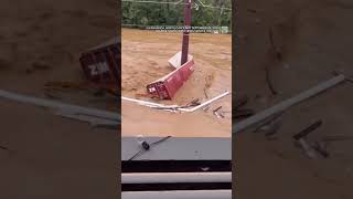 New video from NC shows powerful flood water tearing building in half [upl. by Aniretake]