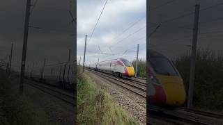 Train at Claypole FOOTBRIDLE CROSSING 11124 Azuma at 125 MPH [upl. by Sanferd883]