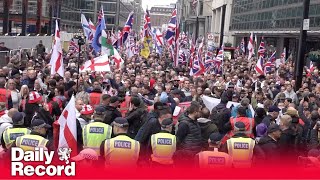 Tommy Robinson protest Thousands gather in central London as activist remains in custody [upl. by Ahsatan]