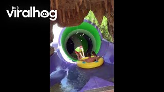 Waterslide Worker Goes On Unexpected Adventure  ViralHog [upl. by Torey]