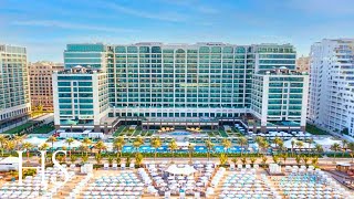 HILTON Dubai Palm Jumeirah Hotel  BEACHFRONT Resort full tour 4K [upl. by Novoj20]