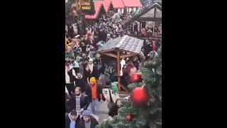 Syrians march through Essen Christmas market in Germany [upl. by Ettesus]