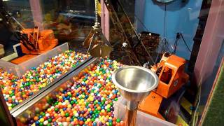 Magnetbased mechanical gumball machine  Mechanical Museum [upl. by Anelram]