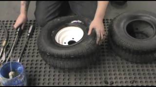 How to Change a Lawn Mower Tire [upl. by Anuaek]