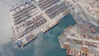 Athens Greece Perama cargo port Unloading and loading containers Container ship at the pier [upl. by Eniarral]